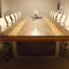 Conference room, custom table with reclaimed wood top, custom steel table bases.