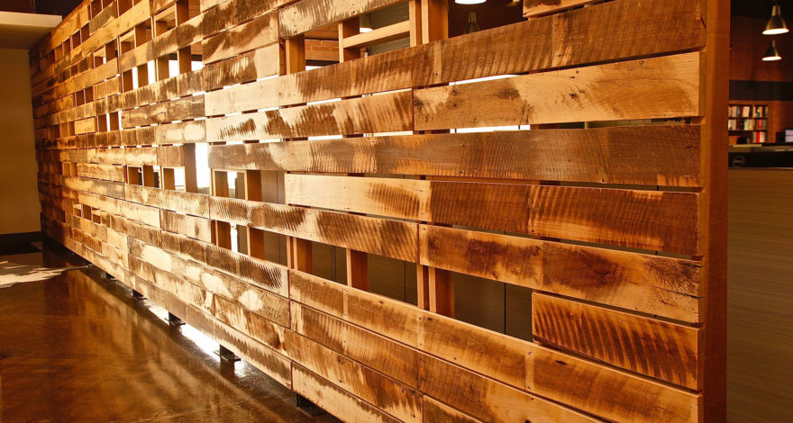 Custom wood framing and reclaimed wood/slat walls and ceiling.